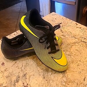 Kids Neon yellow Nike soccer cleats